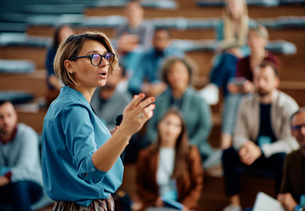 Female speaker discussing new loan administration system and digital transformation with Lenvi