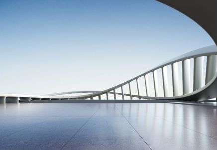 Modern curved architecture reflecting a clear sky, symbolizing Lenvi's global business growth