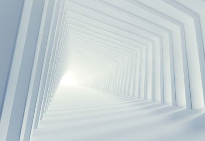 White minimalist tunnel with light, symbolising considerations for selecting a loan origination platform