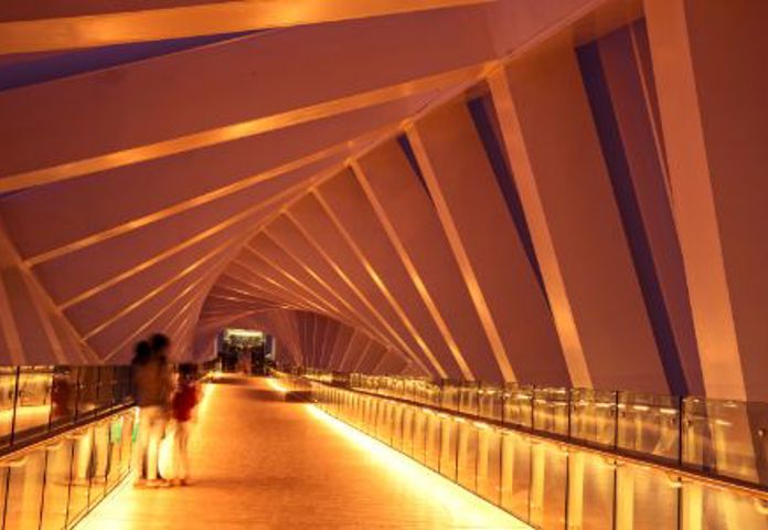 Architectural shot of a warm-toned tunnel bridge, hinting at the CODIX and Lenvi partnership to combat fraud.