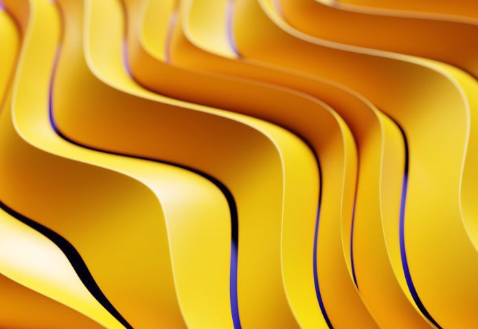 Abstract wavy yellow and orange forms, symbolising the future role of AI in lending