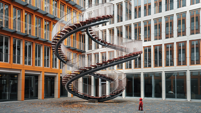 Lenvi banner image winding staircase outside a building